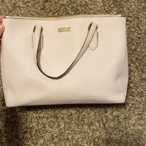 light pink kate spade purse. lightly used